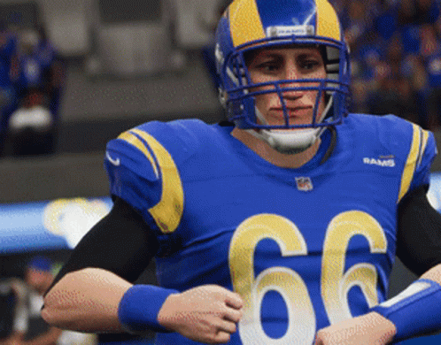 Football Player In Blue Jersey Number 66 GIF