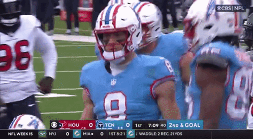 Football Player In Blue Jersey Number 9 GIF