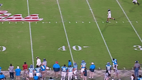 Football Player In Blue Uniform Running GIF