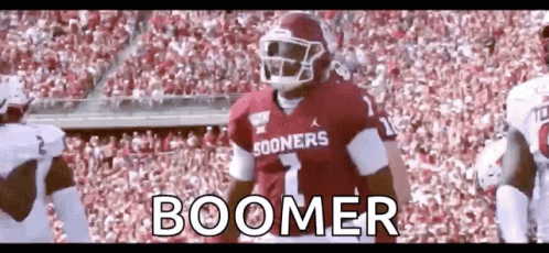 Football Player In Boomer Jersey In Front Of Crowd GIF