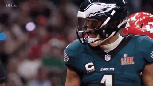 Football Player in Eagles Jersey and Helmet
