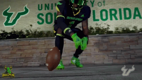 Football Player in Front of University of Florida Sign