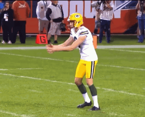 Football Player in Green Bay Packers Helmet