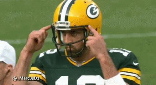 Football Player in Green Bay Packers Helmet