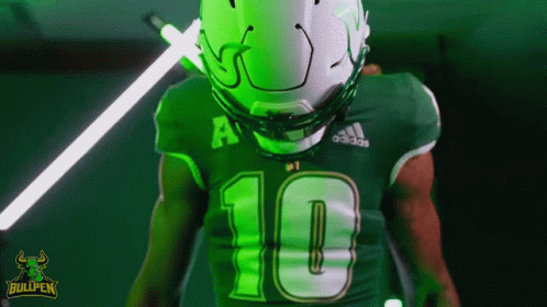 Football Player in Green Jersey Number 10