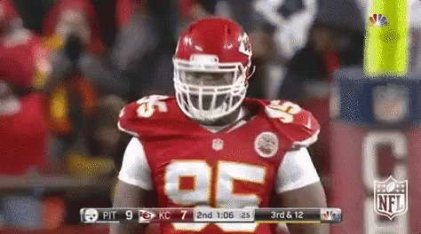 Football Player in Helmet and Jersey 85