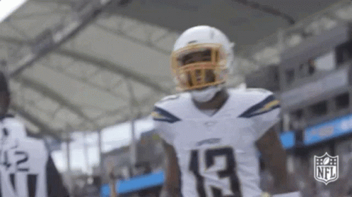Football Player In Helmet And Number 19 Jersey In Stadium GIF