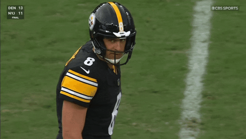 Football Player in Helmet Number 6