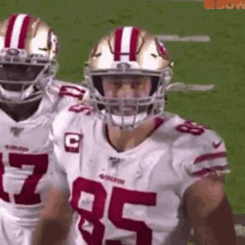 Football Player In Helmet Number 95 On Field GIF