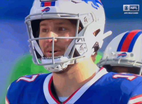 Football Player in Helmet With NFL Logo