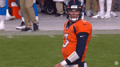 Football Player In Jersey Number 3 Standing On Field GIF