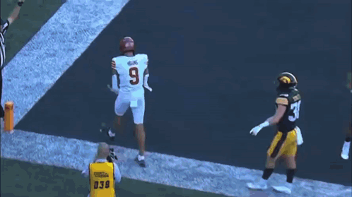 Football Player in Jersey Number 9 on Field