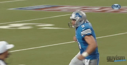 Football Player in Lions Jersey Pointing and Saying Villain