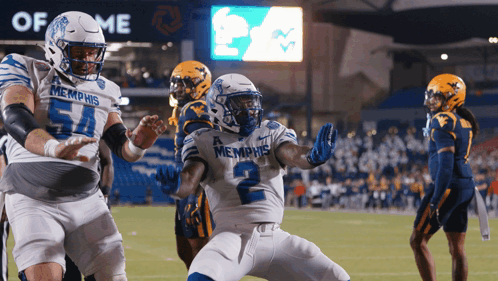 Football Player in Memphis Uniform Running