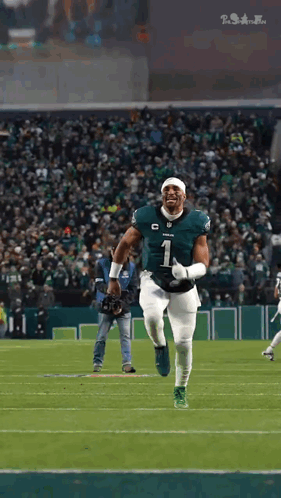 Football Player in Number 1 Jersey Running