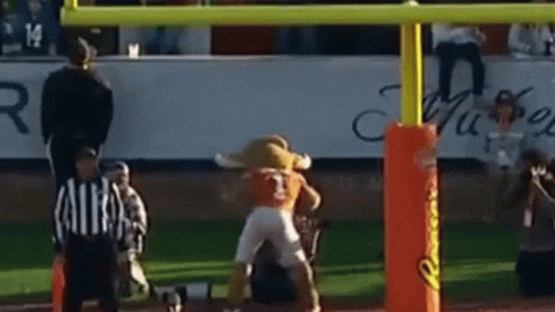 Football Player in Number 1 Jersey Tackled