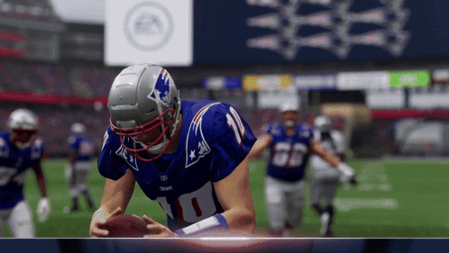 Football Player In Number 10 Jersey Holding Football GIF