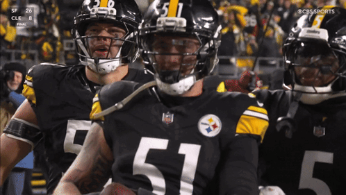 Football Player In Number 51 Jersey Holding Football GIF