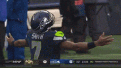Football Player In Number 7 Jersey Kneeling GIF