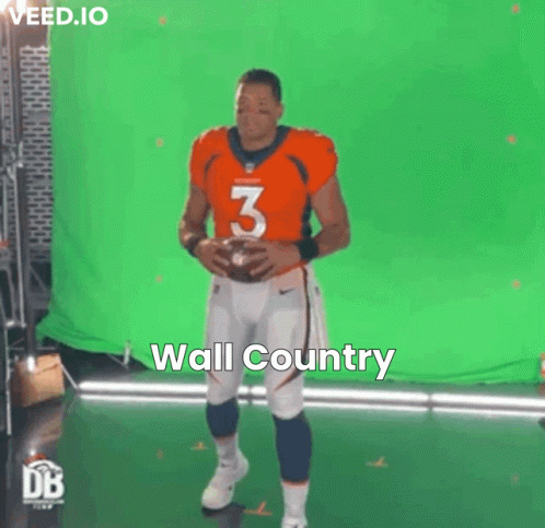 Football Player in Orange Jersey Number 3