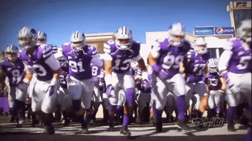 Football Player in Purple Jersey Number 1