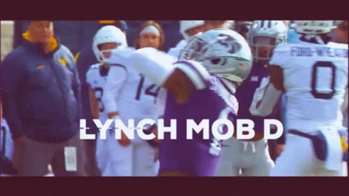 Football Player in Purple Jersey Number 14