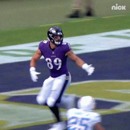 Football Player in Purple Jersey Number 89