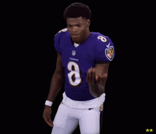Football Player in Purple Uniform Number 8