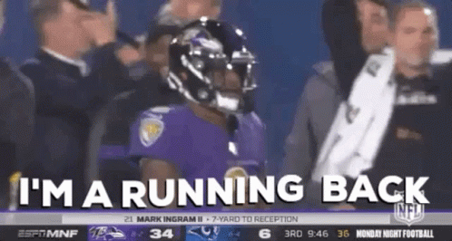 Football Player in Purple Uniform Running Back