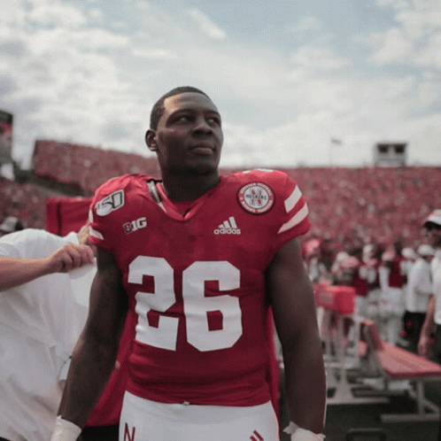 Football Player in Red Adidas Jersey Number 26
