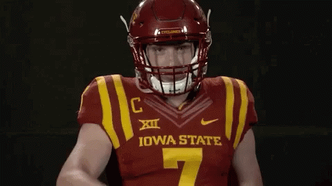 Football Player in Red and Yellow Jersey and Helmet