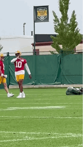 Football Player In Red Jersey Number 10 Running GIF