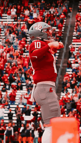 Football Player in Red Jersey Number 10