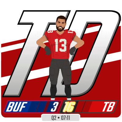 Football Player in Red Jersey Number 13