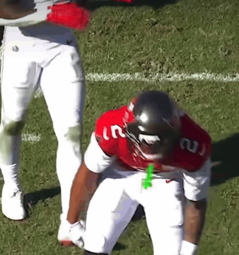 Football Player in Red Jersey Number 21