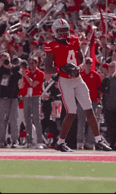 Football Player in Red Jersey Number 4