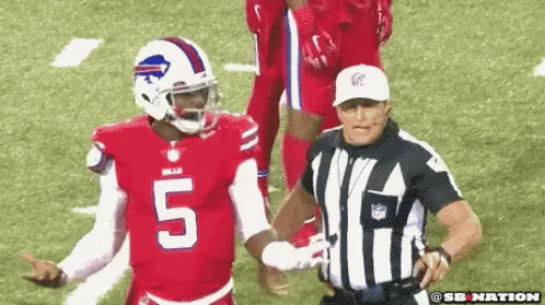 Football Player in Red Jersey Number 5