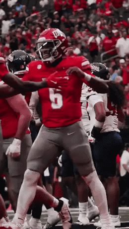 Football Player in Red Jersey Number 5