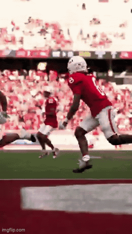 Football Player in Red Jersey Number 8