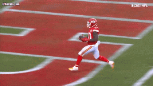 Football Player in Red Uniform Number 10