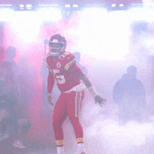 Football Player In Red Uniform Number 12 GIF