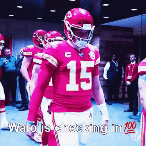 Football Player in Red Uniform Number 15