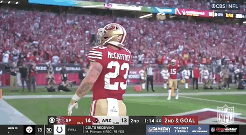 Football Player in Red Uniform Number 23