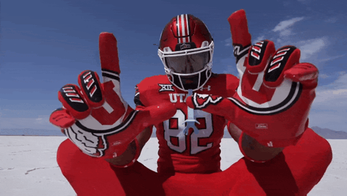 Football Player in Red Uniform Number 62