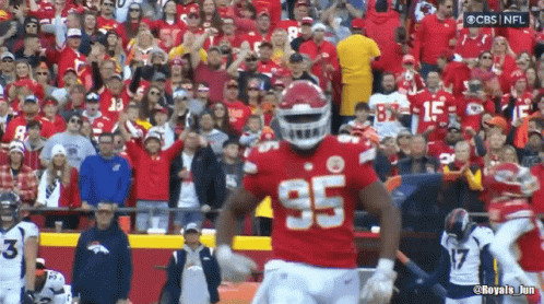 Football Player in Red Uniform Number 95