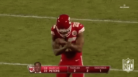 Football Player in Red Uniform