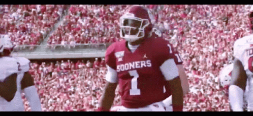 Football Player in Sooners Jersey on Field