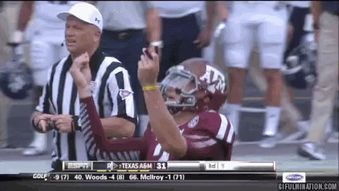 Football Player in Texas A&M Jersey With Referee