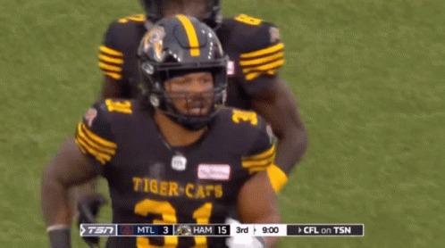Football Player in Tiger Cats Jersey