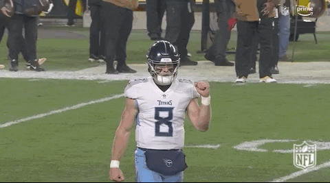 Football Player In Titans Jersey With Fist In Air GIF